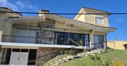 Hotel con dos casas