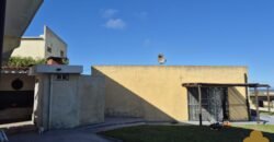 Hotel con dos casas