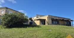 Hotel con dos casas