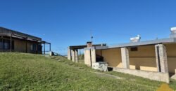Hotel con dos casas