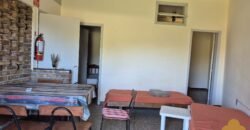 Hotel con dos casas