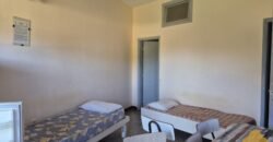 Hotel con dos casas